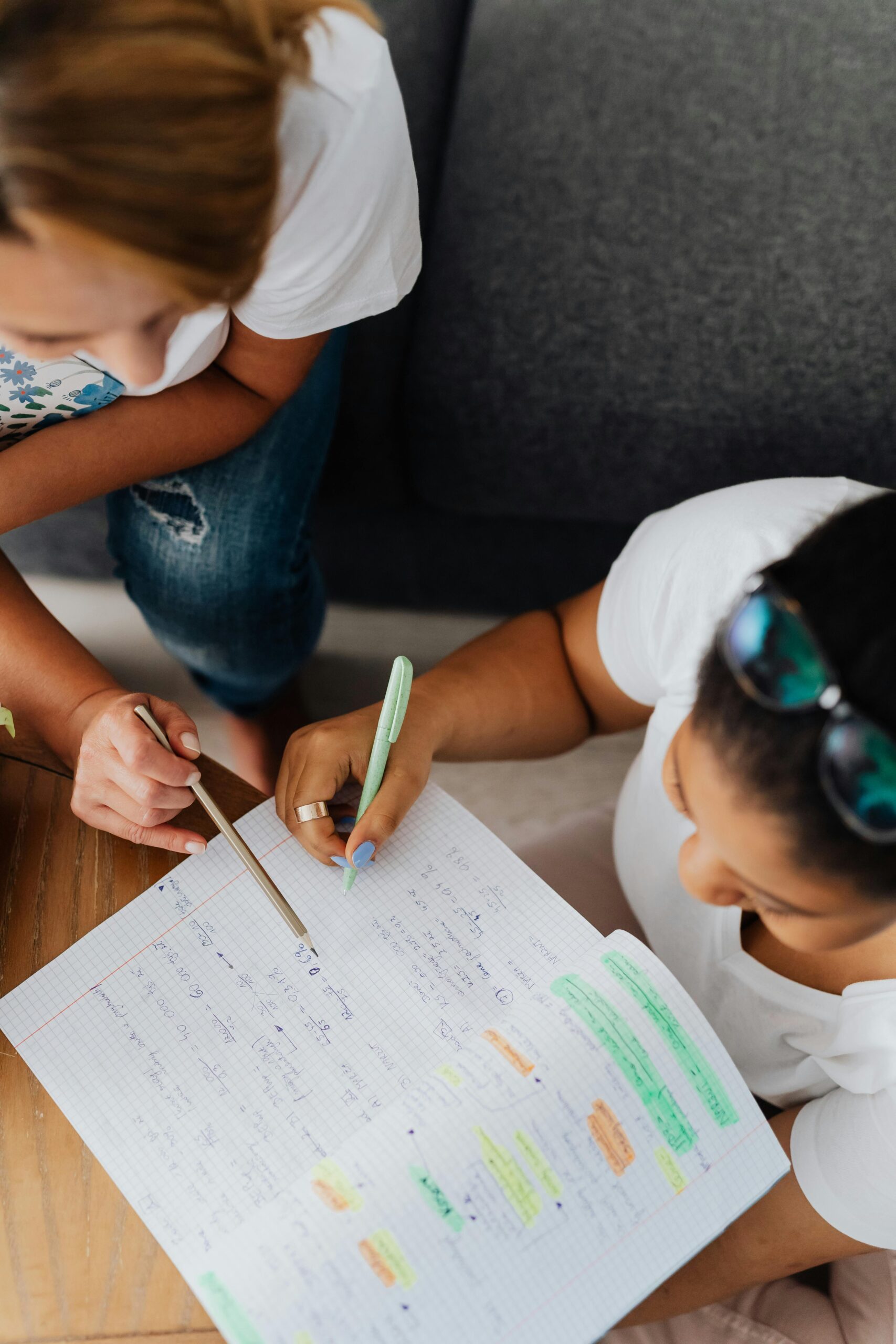 Overhead shot of teacher teaching a student